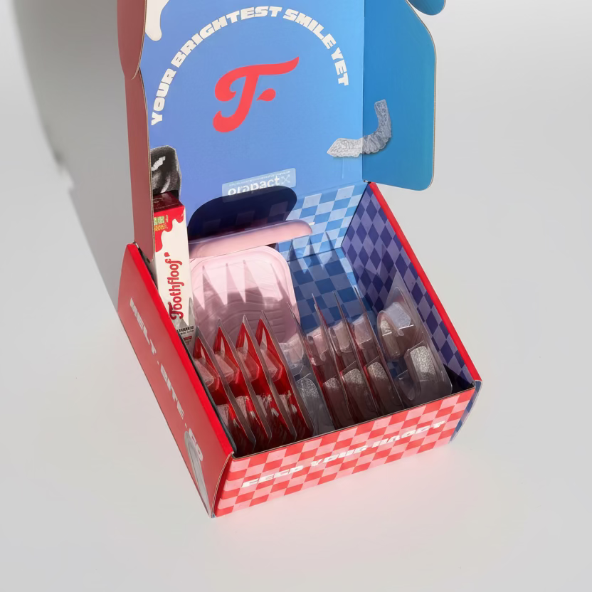 Box of toothfloof ultimate teeth whitening bundle kit