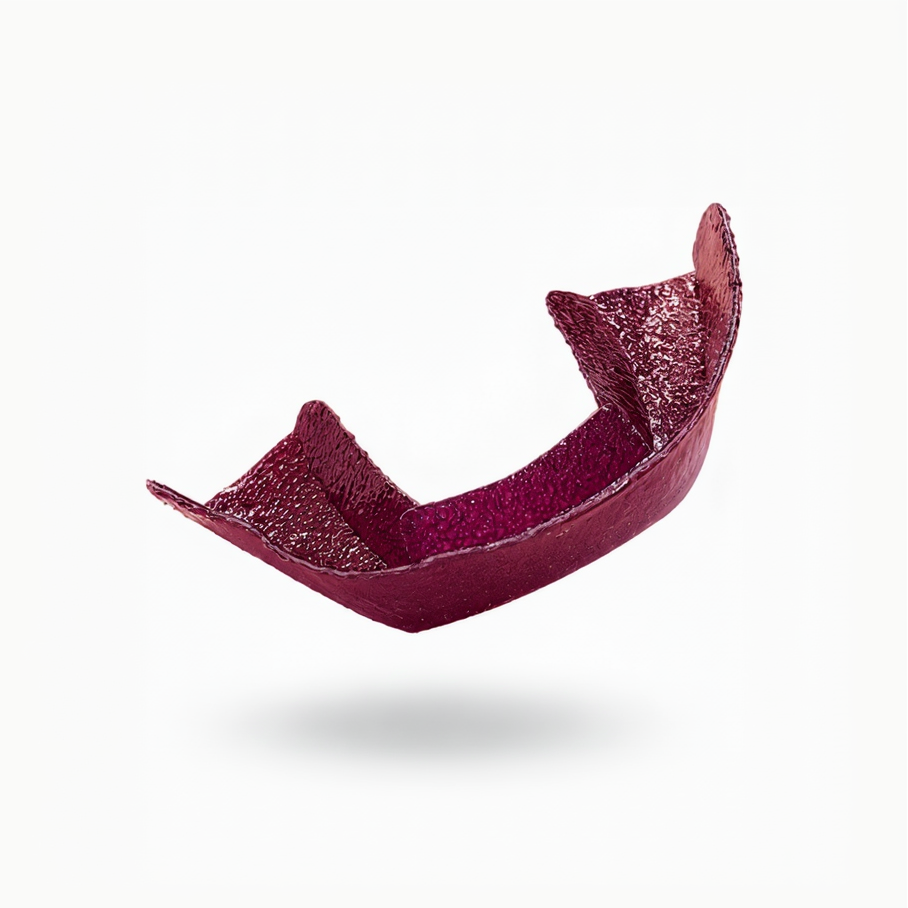 Purple teeth whitening orawrap semi-custom whitening tray. Better than strips.