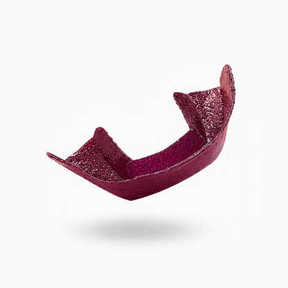 Purple teeth whitening orawrap semi-custom whitening tray. Better than strips.