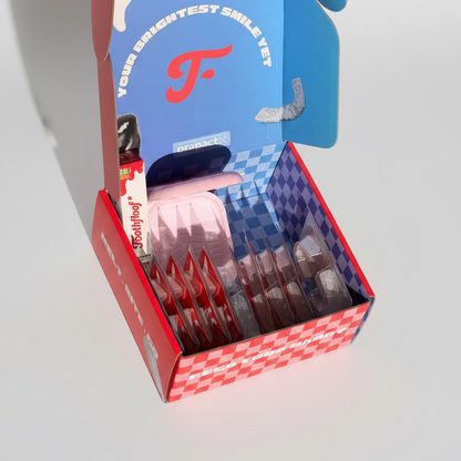 Box of toothfloof ultimate teeth whitening bundle kit